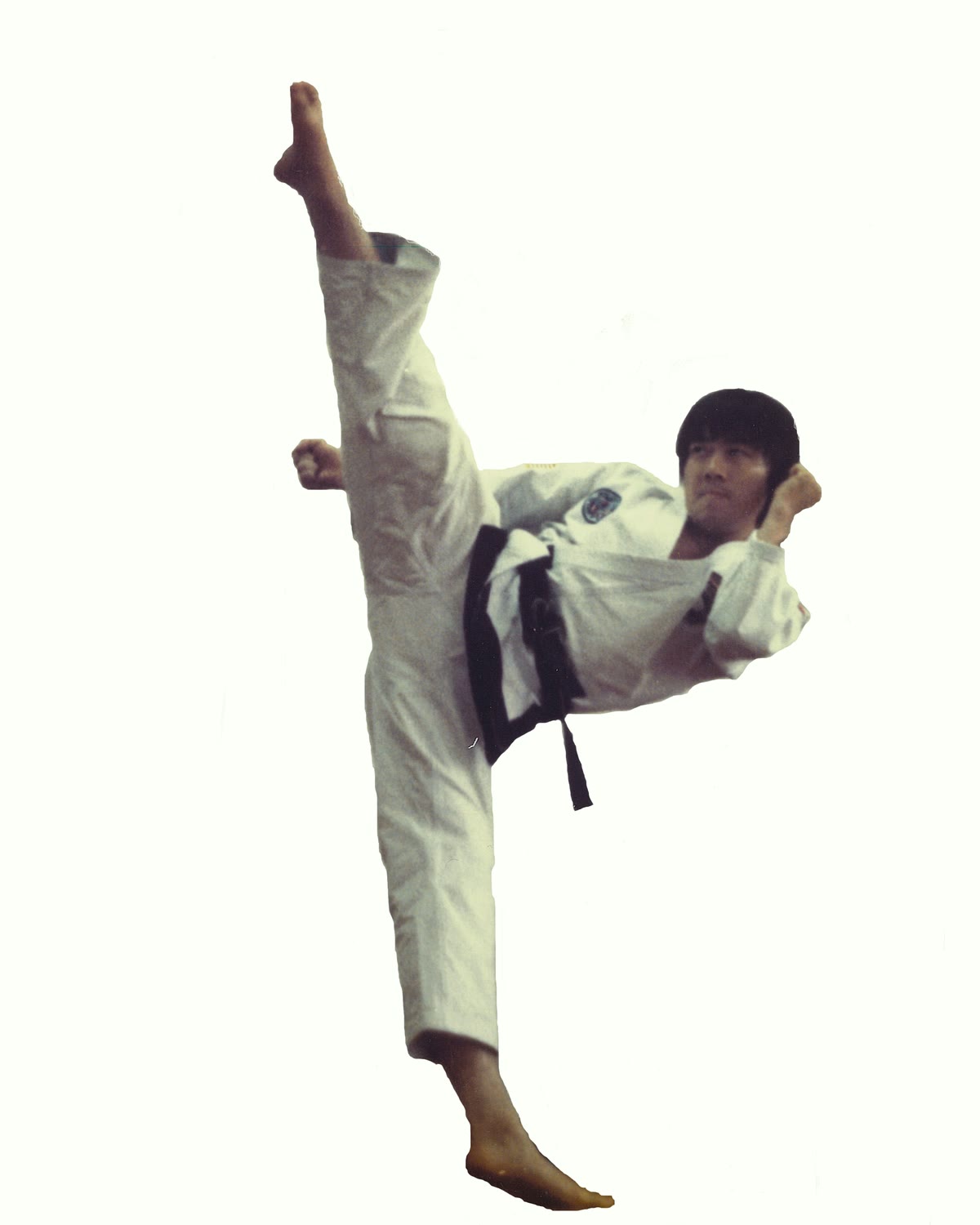 Grandmaster Chung demonstrating a high kick.